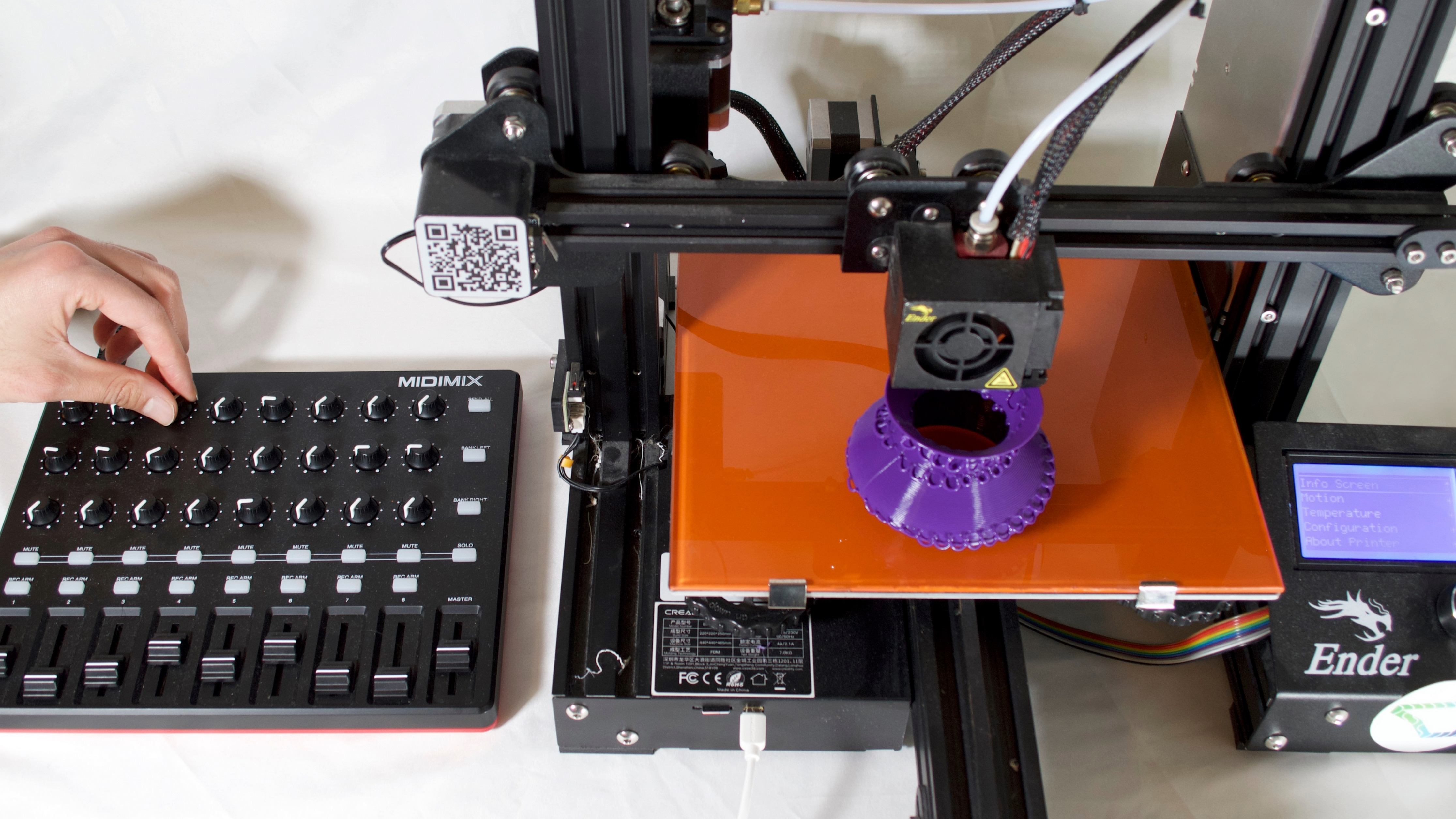 a midi controller connected to a 3D printer